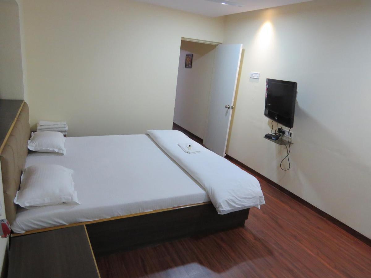 Apple Tree Apartments Koregaon Park Пуна Экстерьер фото
