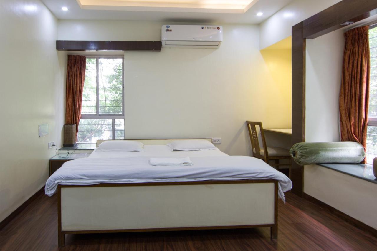 Apple Tree Apartments Koregaon Park Пуна Экстерьер фото
